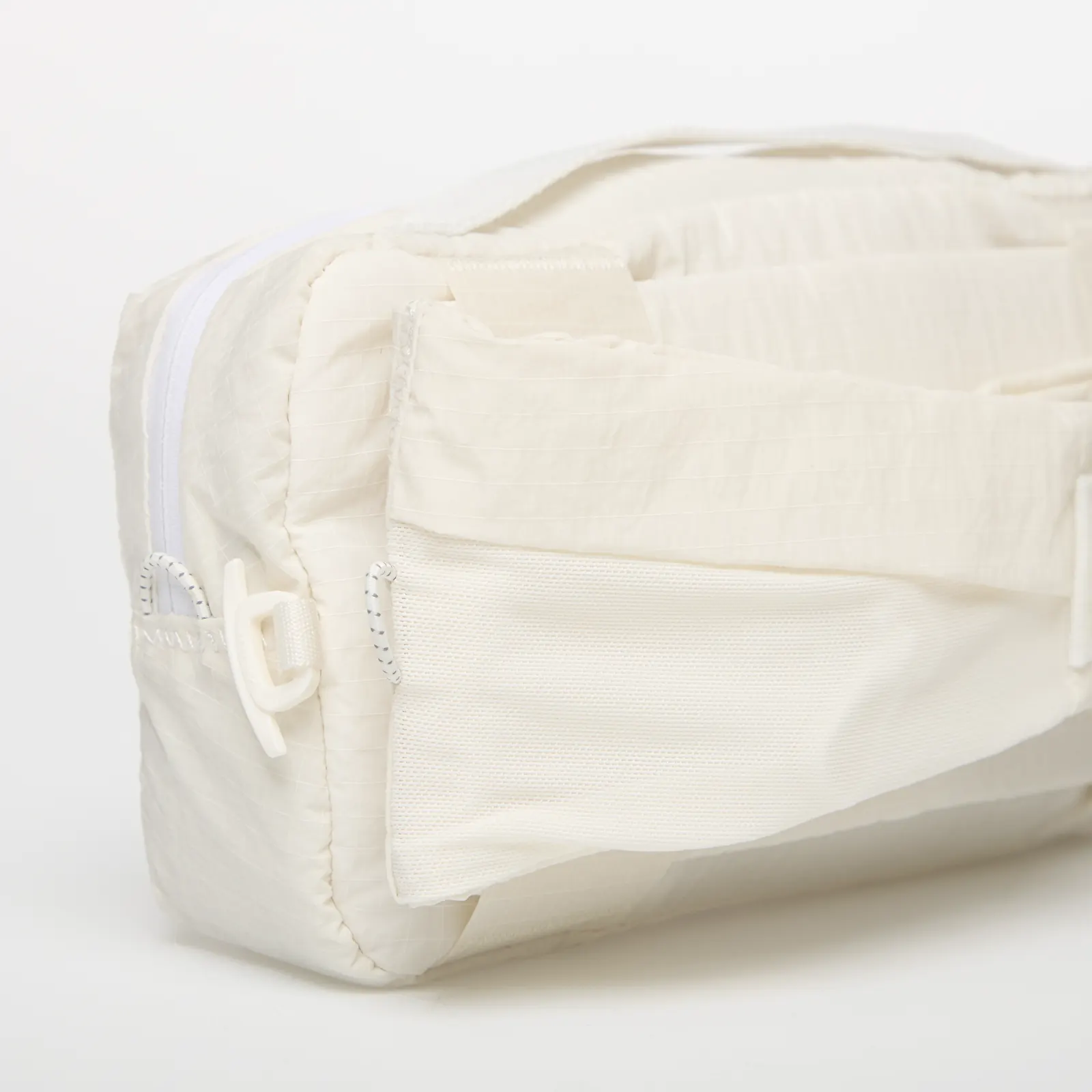 Genți de șold New Balance n Sling Belt Sea Salt