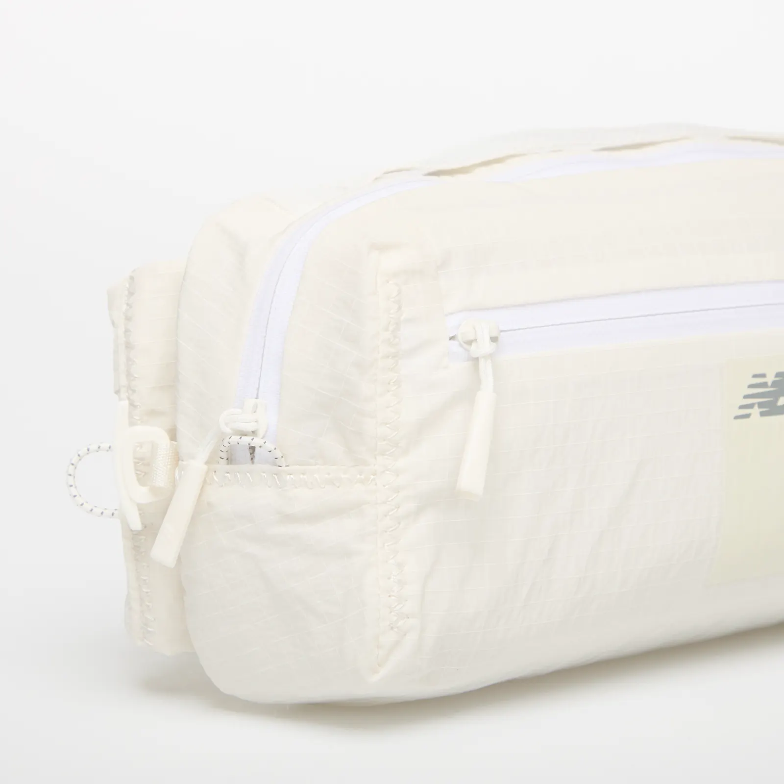 Genți de șold New Balance n Sling Belt Sea Salt