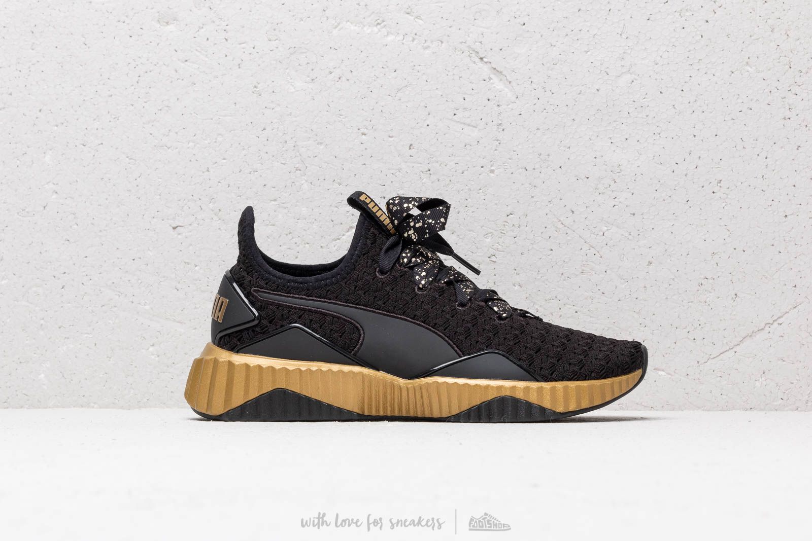 Women s shoes Puma Defy Sparkle Wmns Puma Black Puma Team Gold