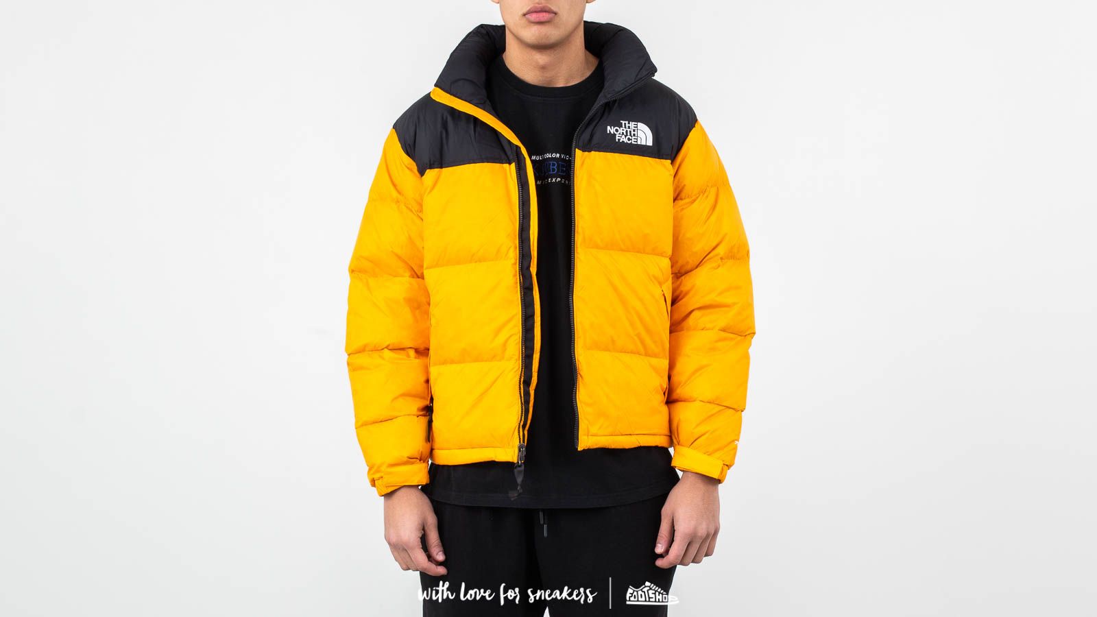 https www.footshop fr vestes 36542 the north face m 1996 retro nuptse jacket zinni orange.html