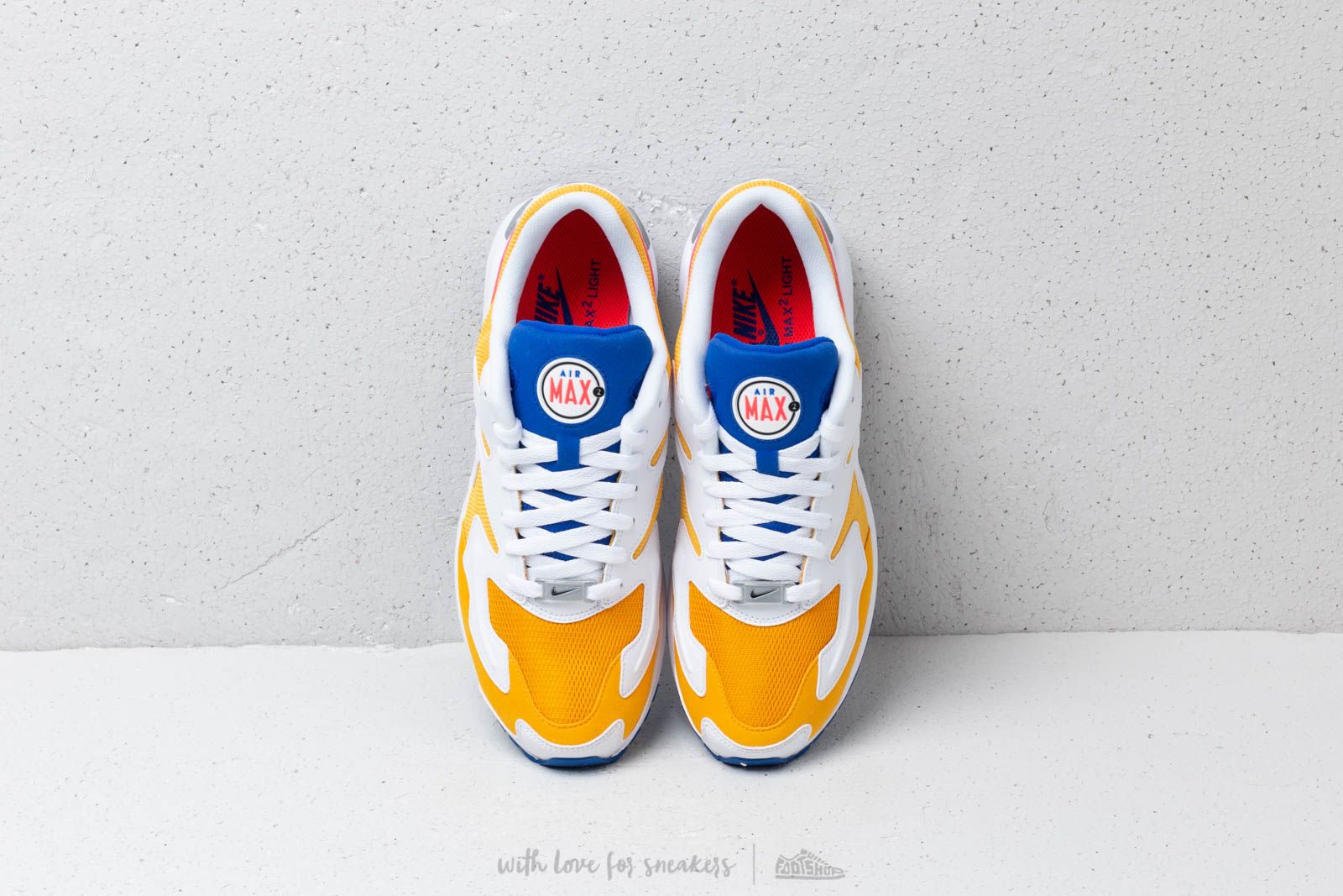 Air max light 2 university gold shop
