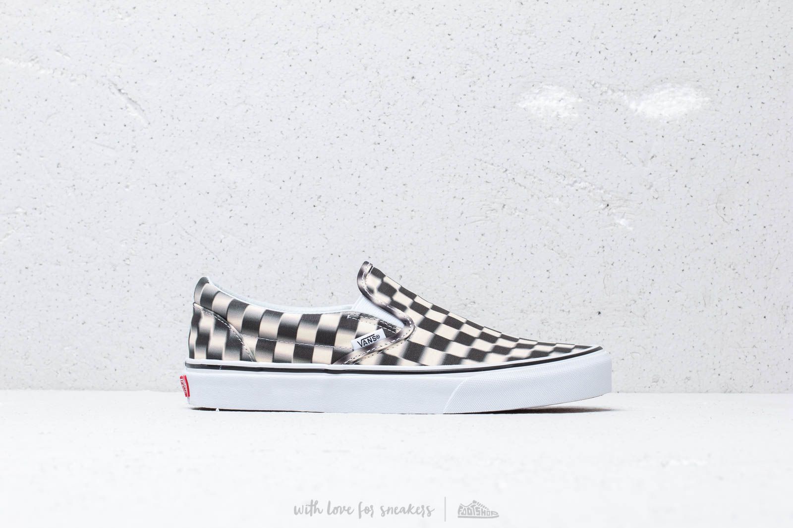 Blurred checkered clearance slip on vans