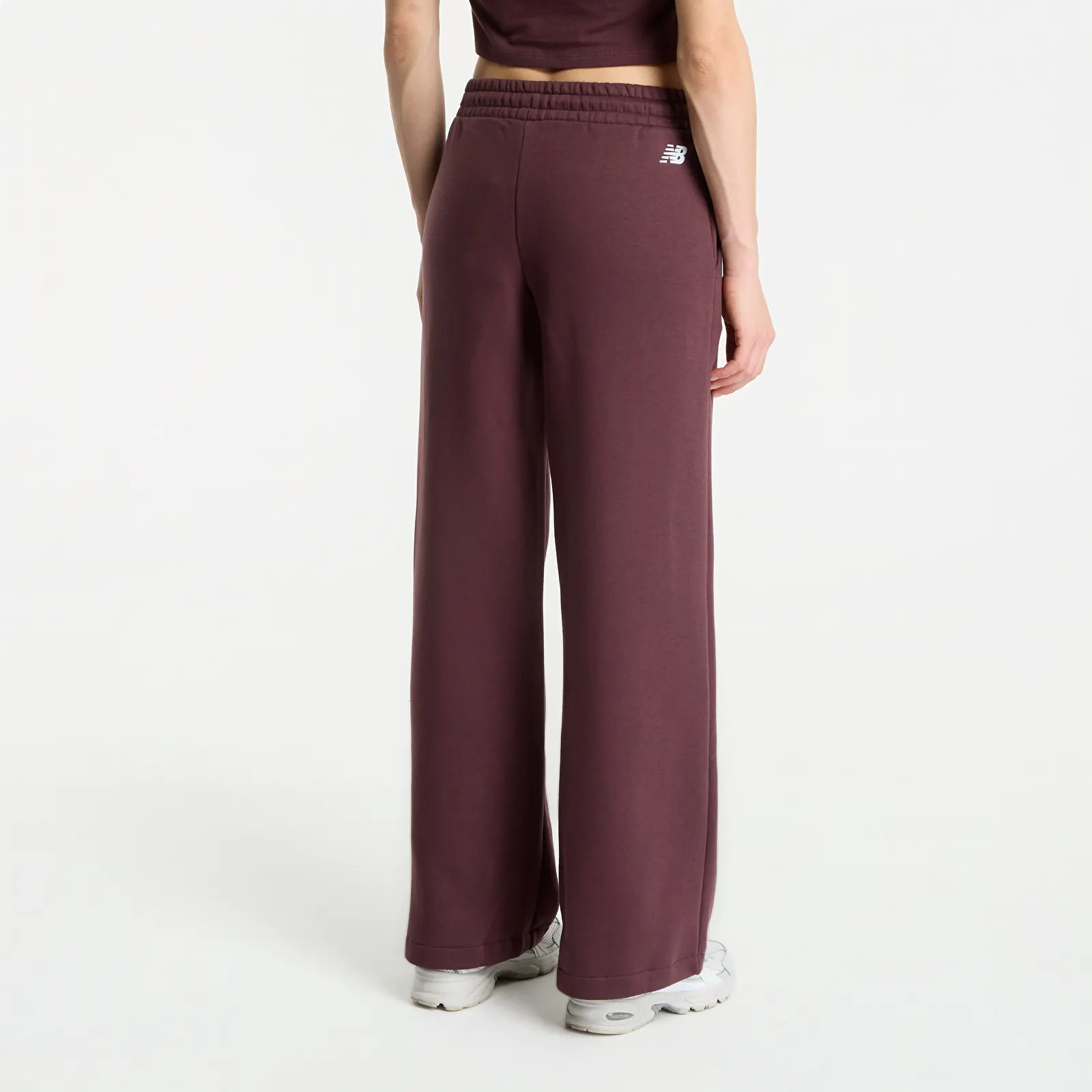 Tepláky New Balance Trackside Fleece Pant Cherry Leather