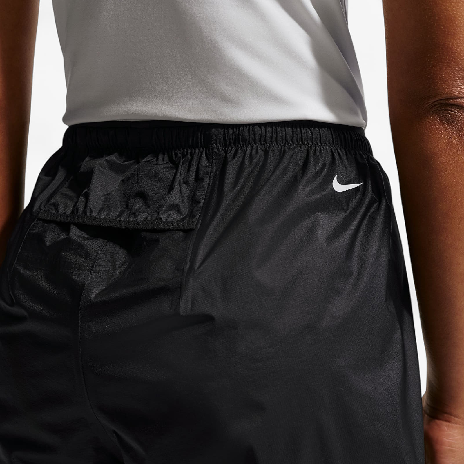 Női nadrágok Nike ACG Women's Storm-FIT ADV Mid-Rise Trail Running Pants Black/ Summit White