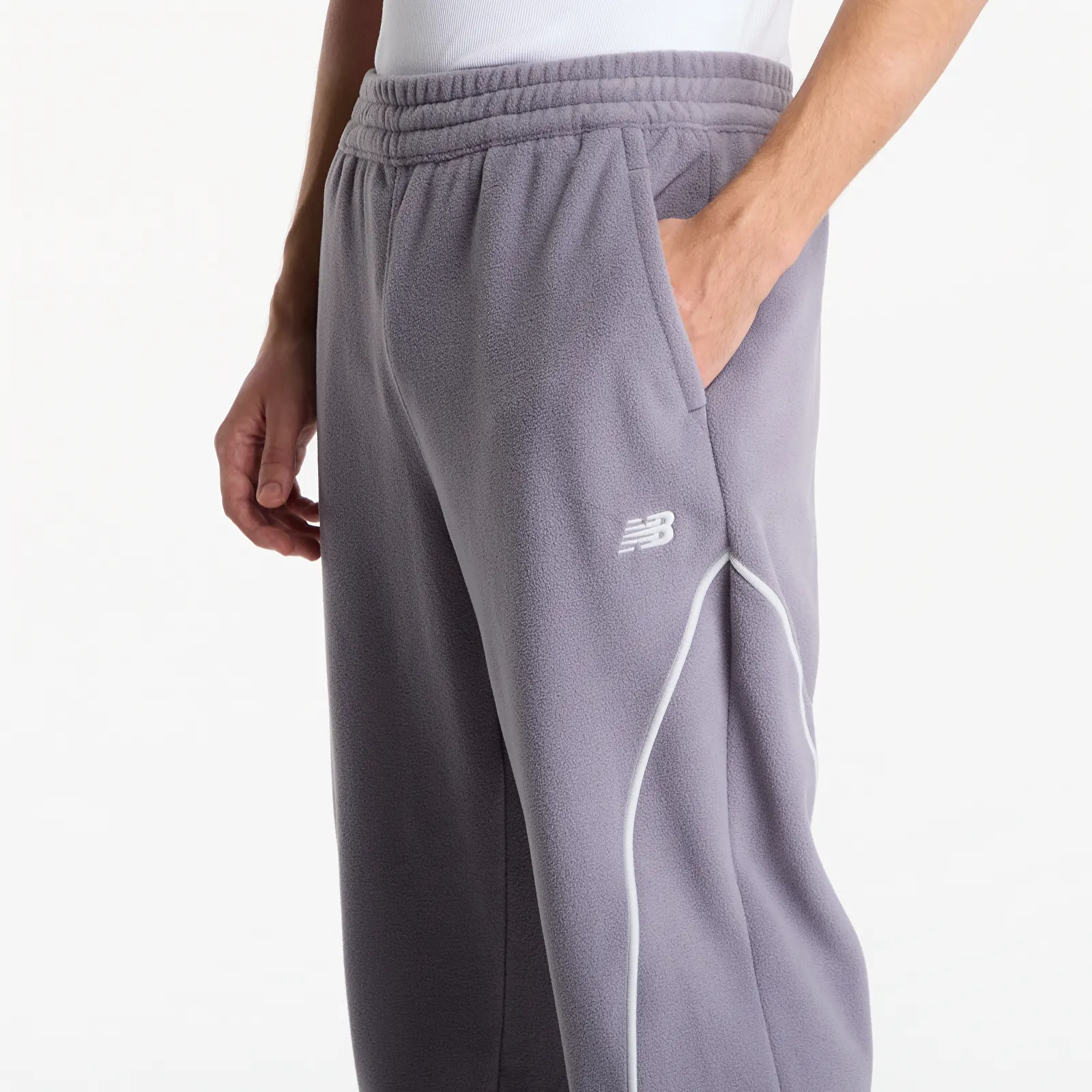 Joggingbukser New Balance Trackside Polar Fleece Jogger Off-Line Grey