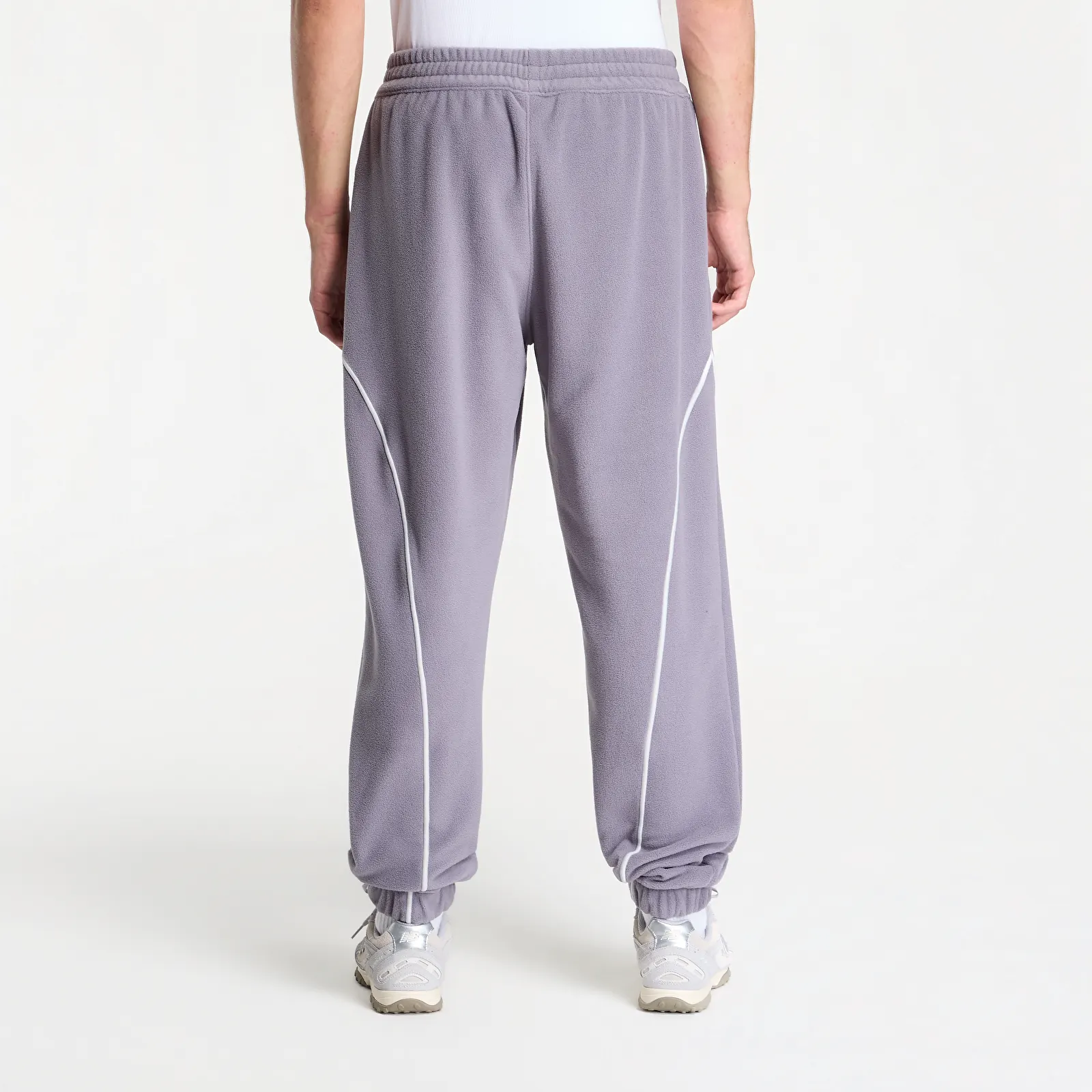 Joggingbukser New Balance Trackside Polar Fleece Jogger Off-Line Grey