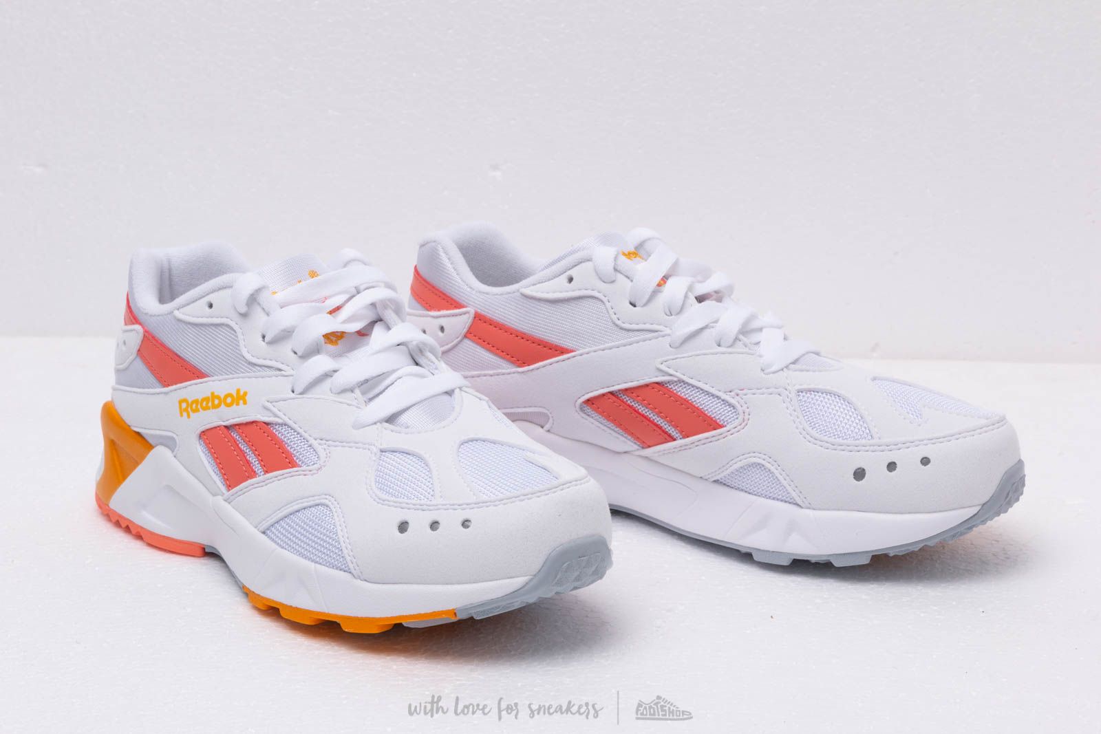 Reebok aztrek white and orange best sale