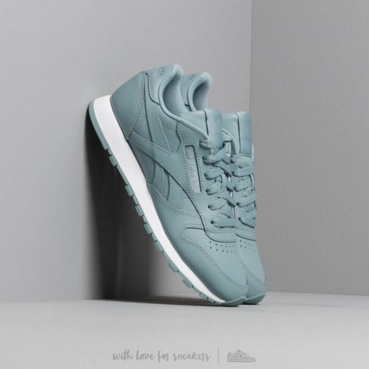 Teal reeboks top