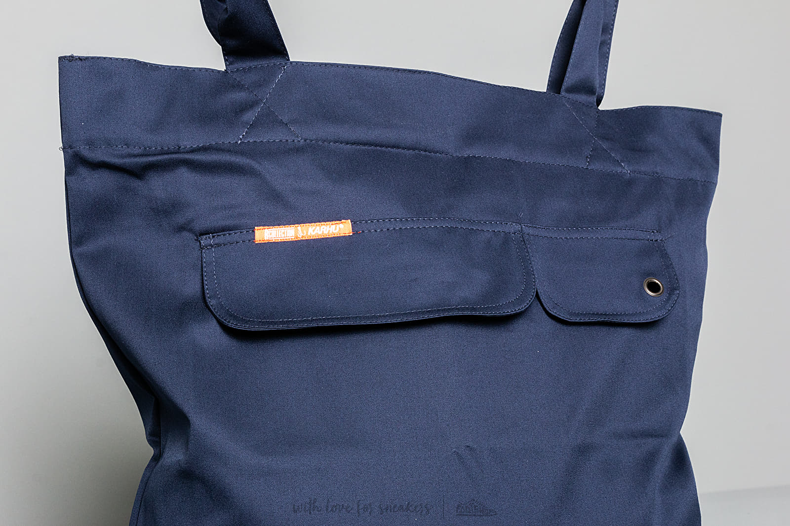 Crossbody-tasker Karhu X R-Collection: “CATCH OF THE DAY” Anorak Bag XL Patriot Blue