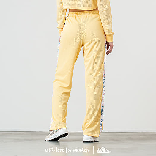 Fila yellow pants on sale