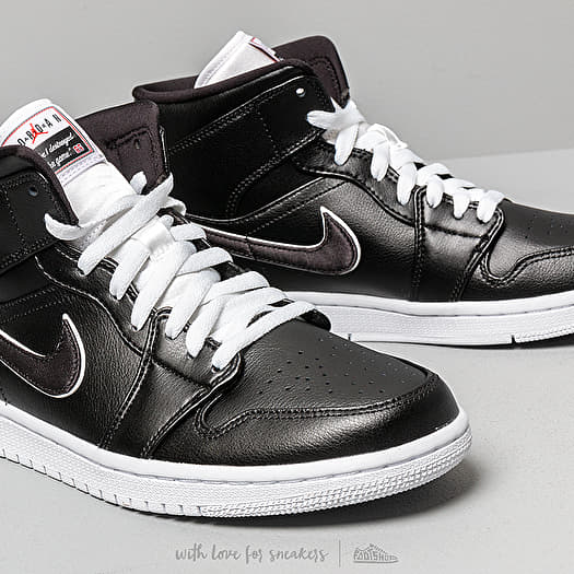 foot locker black and white jordans