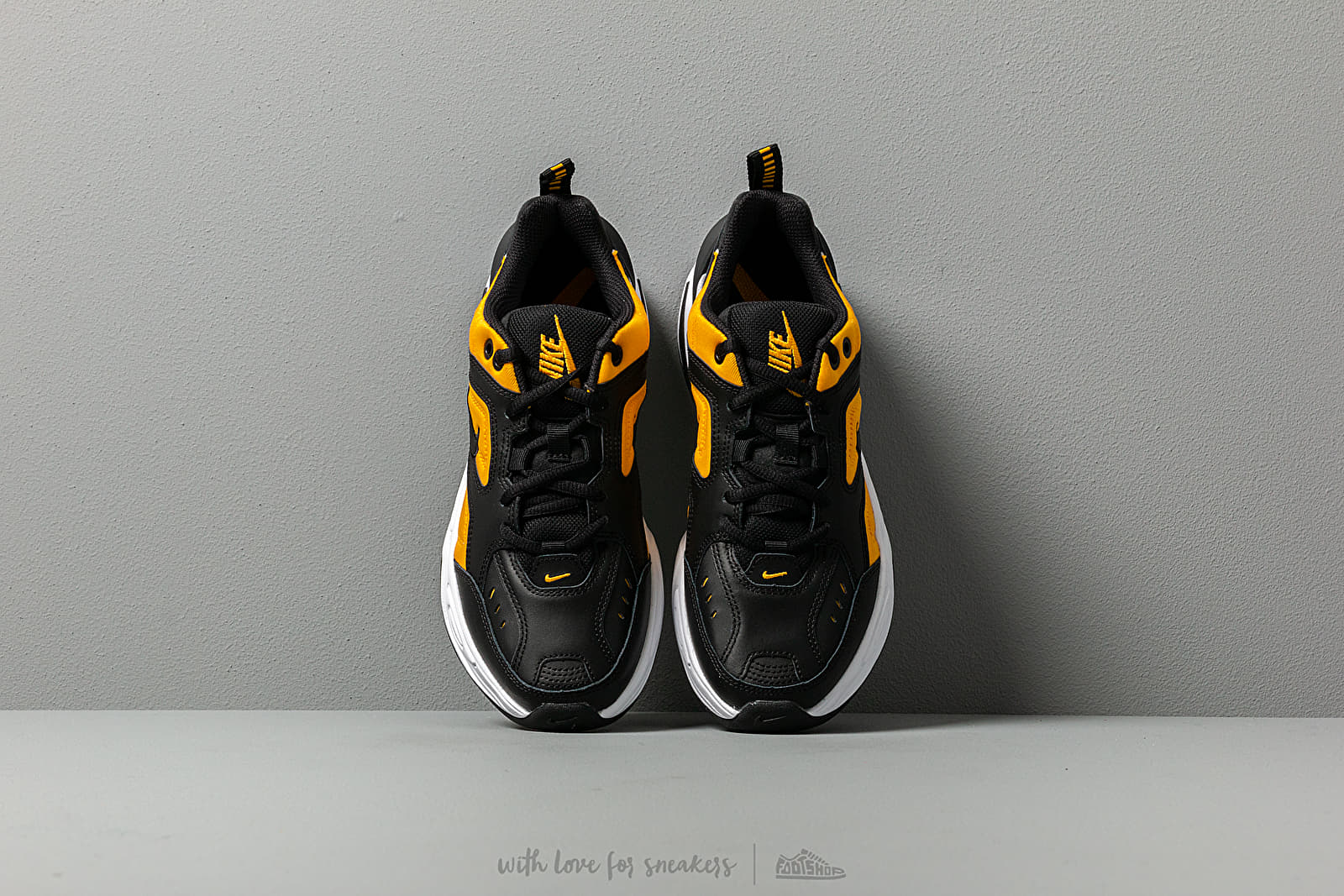 Women s shoes Nike W M2K Tekno Black Black University Gold White Footshop