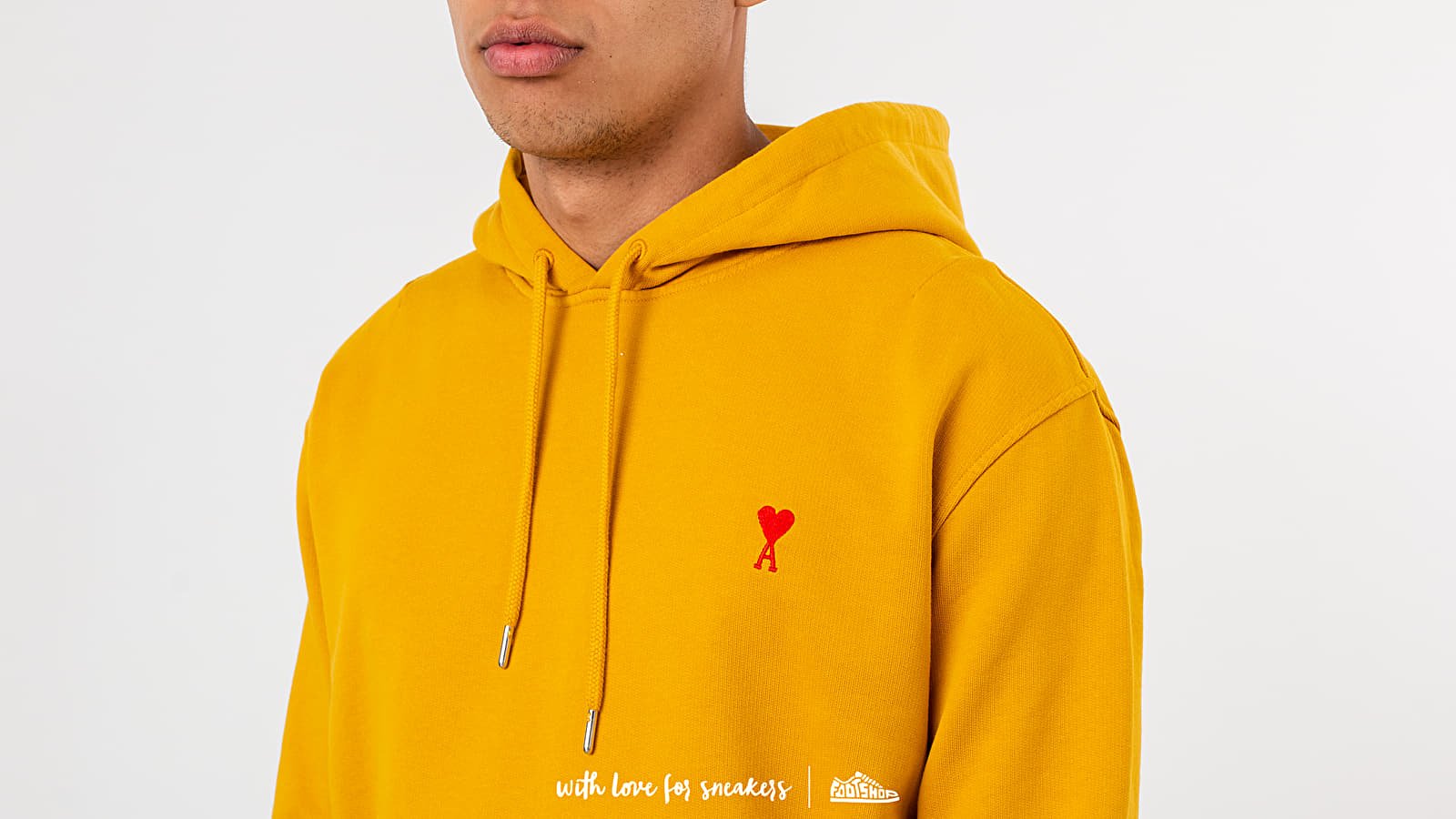 Yellow hoodie with broken 2024 heart