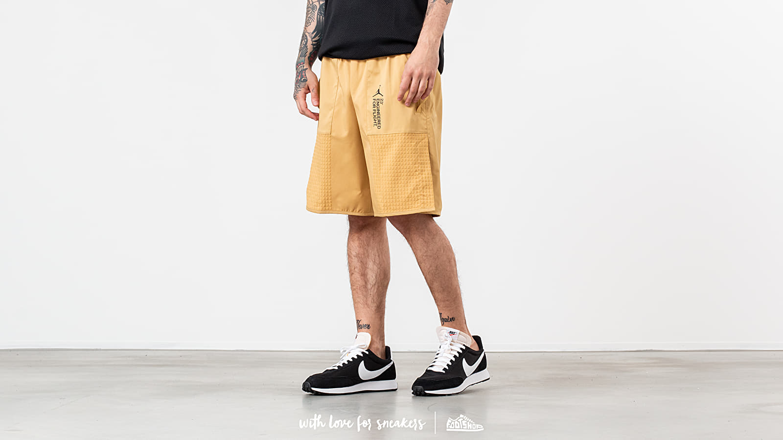 Black and gold jordan shorts hotsell