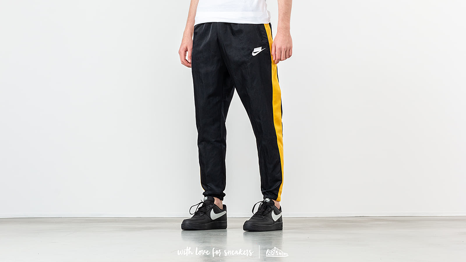 Canvas pants Nike Sportswear Woven Pant Black Yellow Ochre White Footshop