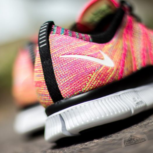 White and pink nike free flyknit top