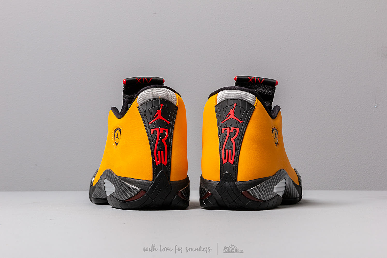 Air jordan 14 arancione clearance