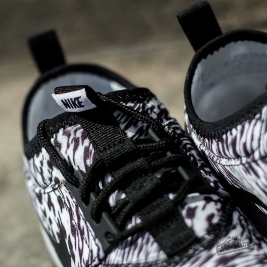 Black nike juvenate trainers online