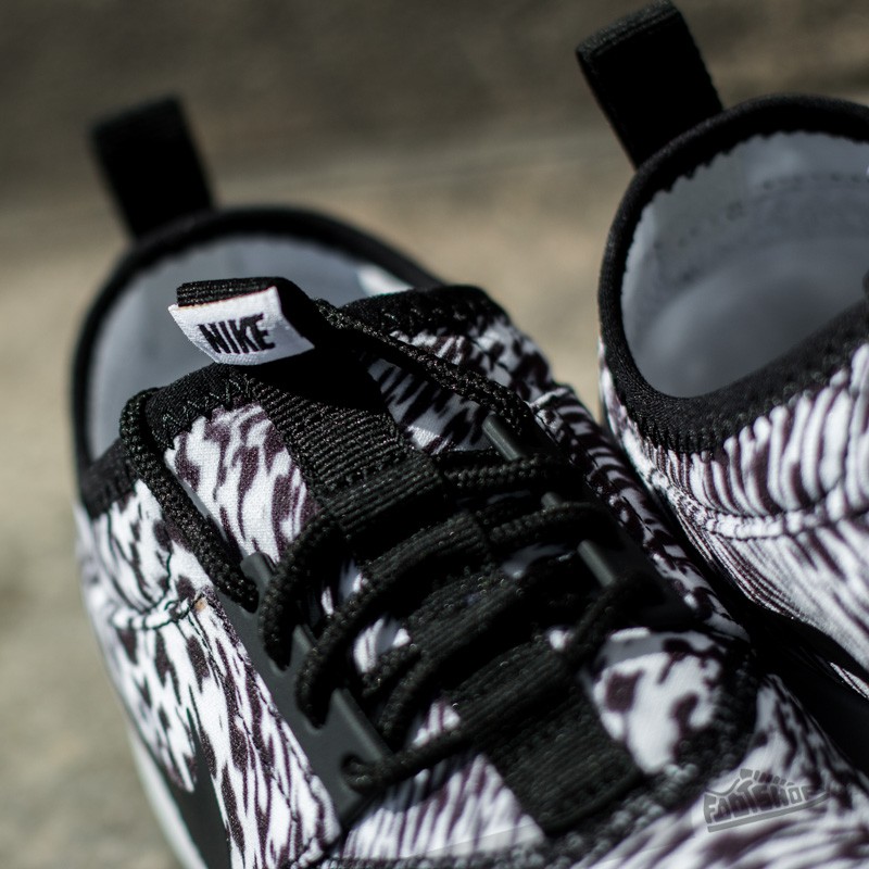 Nike juvenate black and white shop