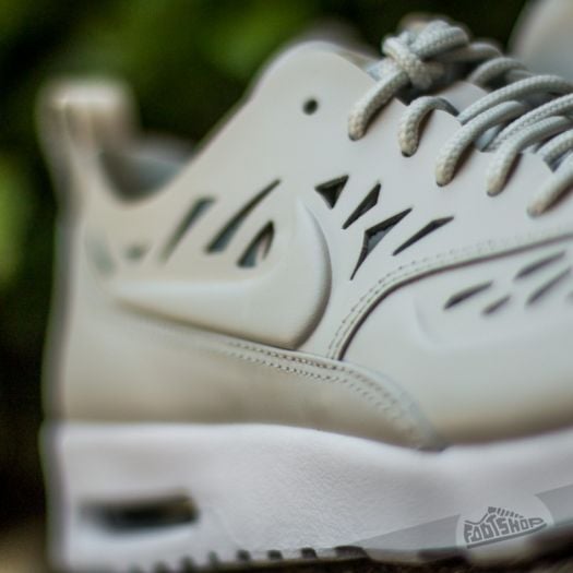 Nike thea joli bone 2025