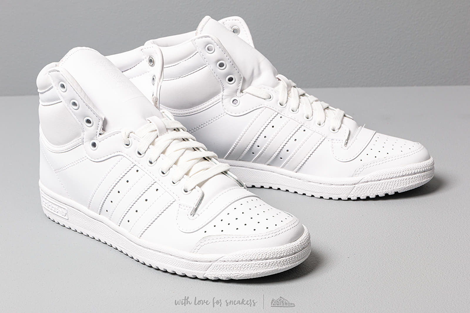 All white adidas high top cheap