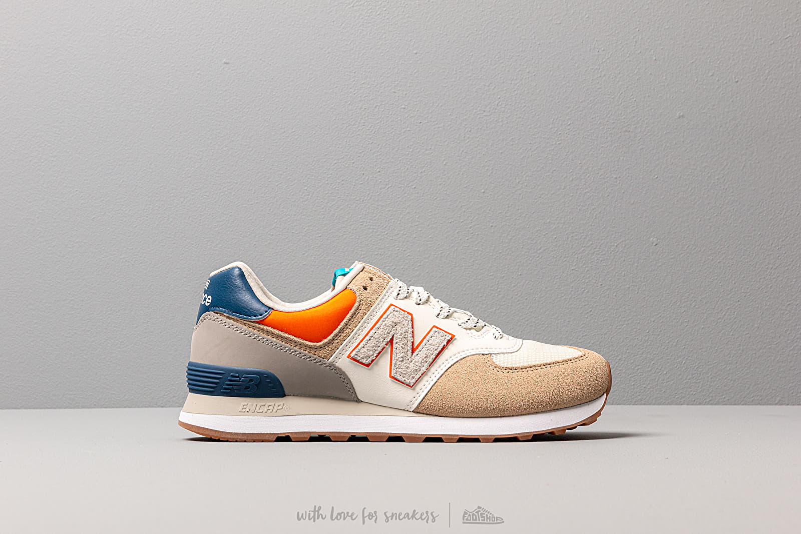 Chaussures et baskets homme New Balance 574 Beige Blue Orange Footshop