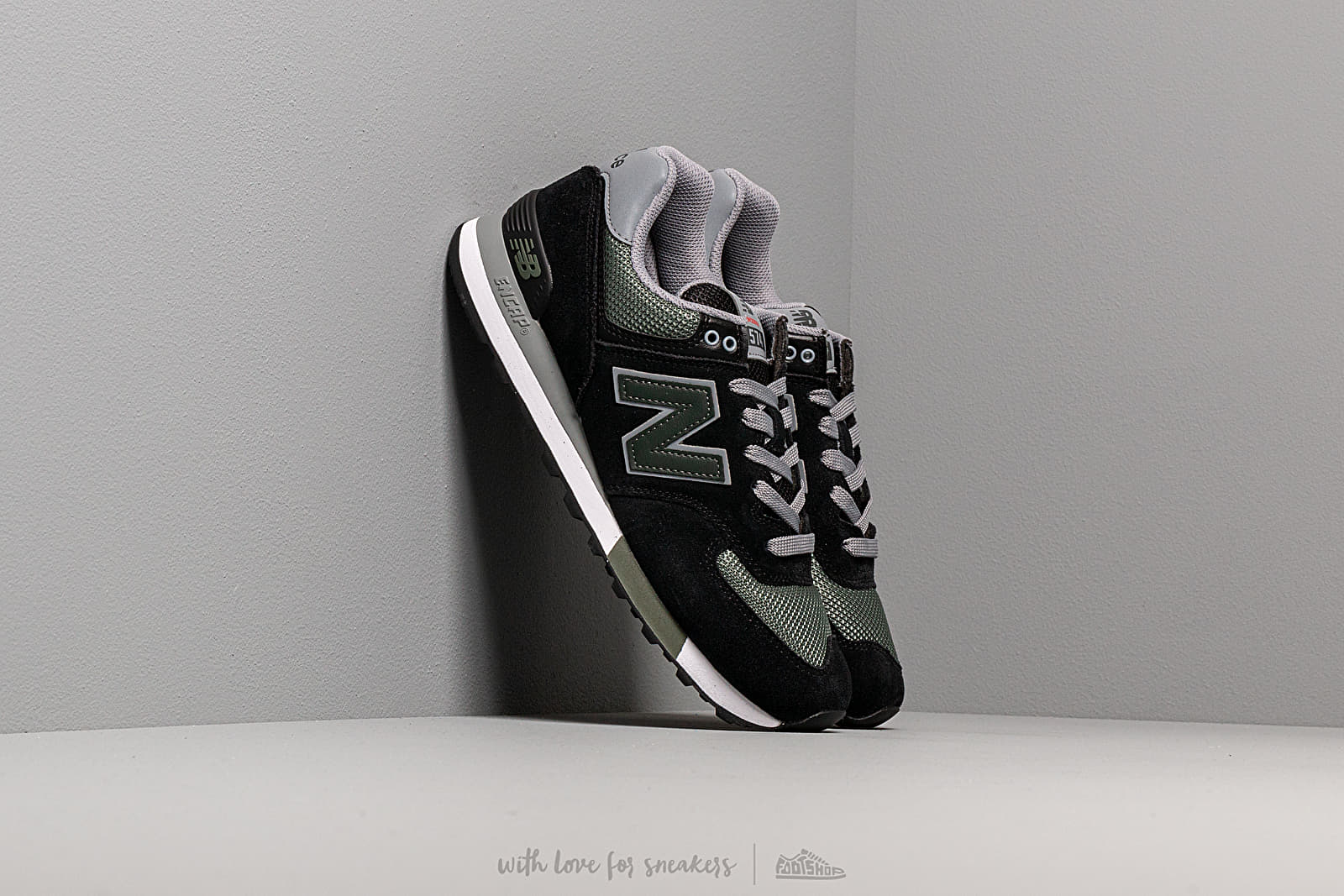 New balance black green deals