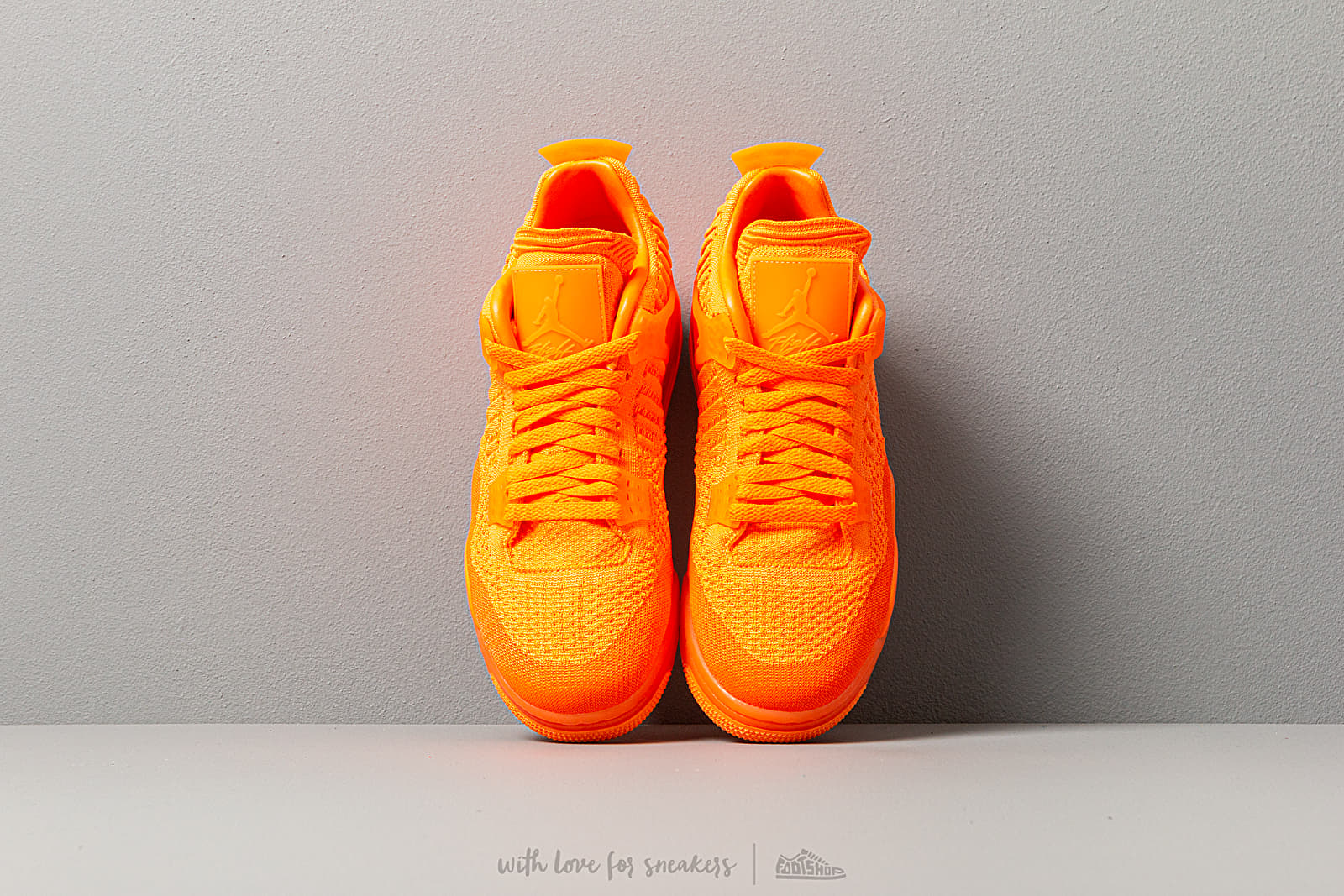 Jordan 4 retro flyknit orange online