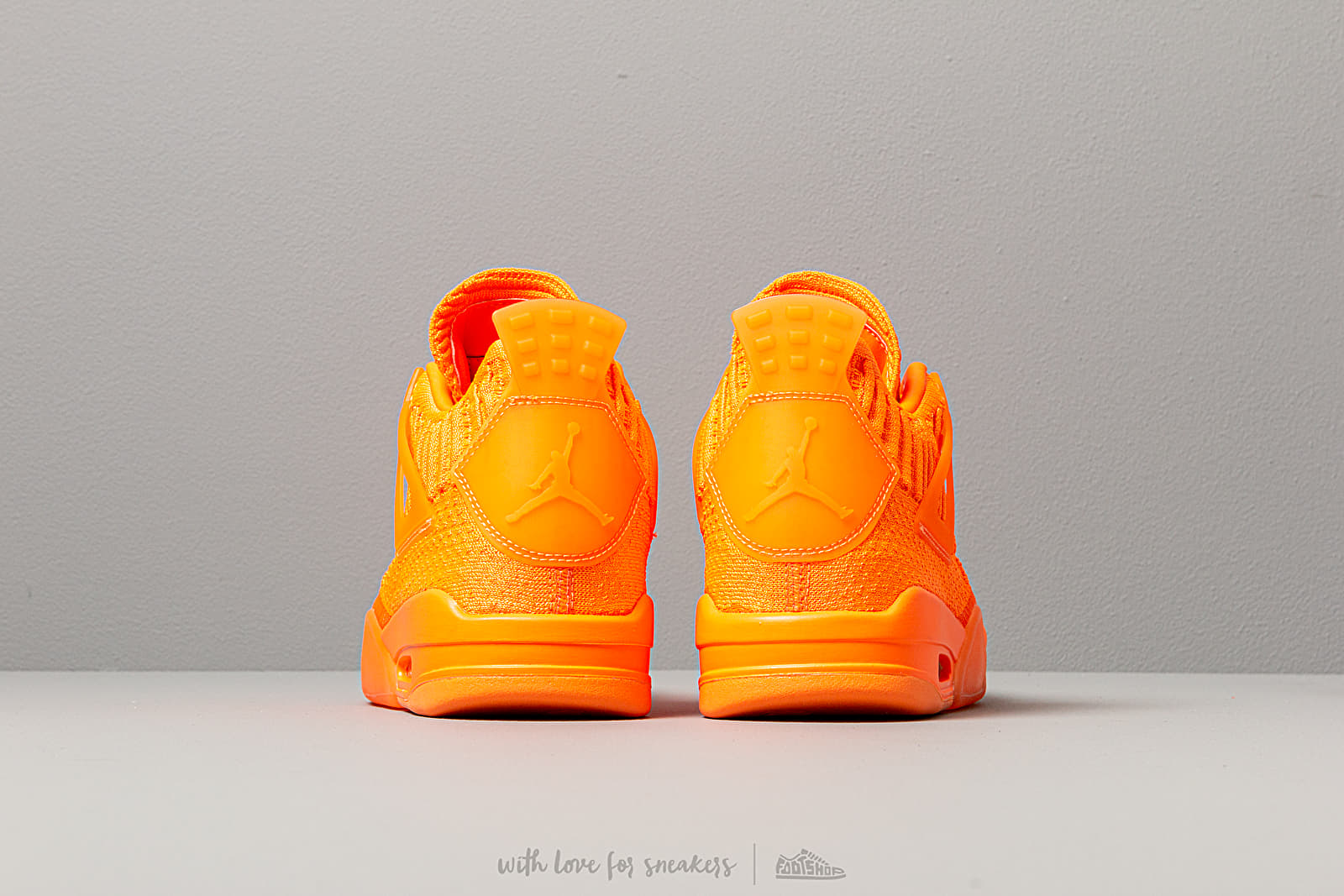 Air jordan 4 retro flyknit total orange discount
