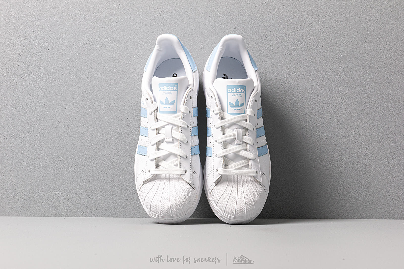 Light blue stripe adidas superstars 2025