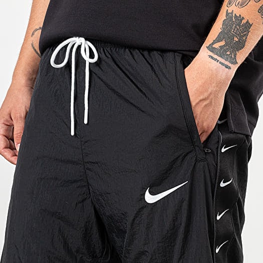 Nike sportswear swoosh woven pants 2025