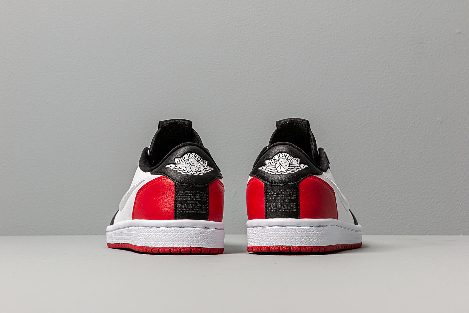 Jordan women's air jordan retro low store slip trainer white / red / black