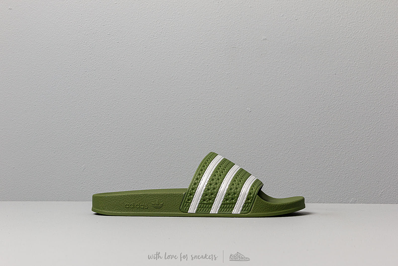 Olive green adidas slides online