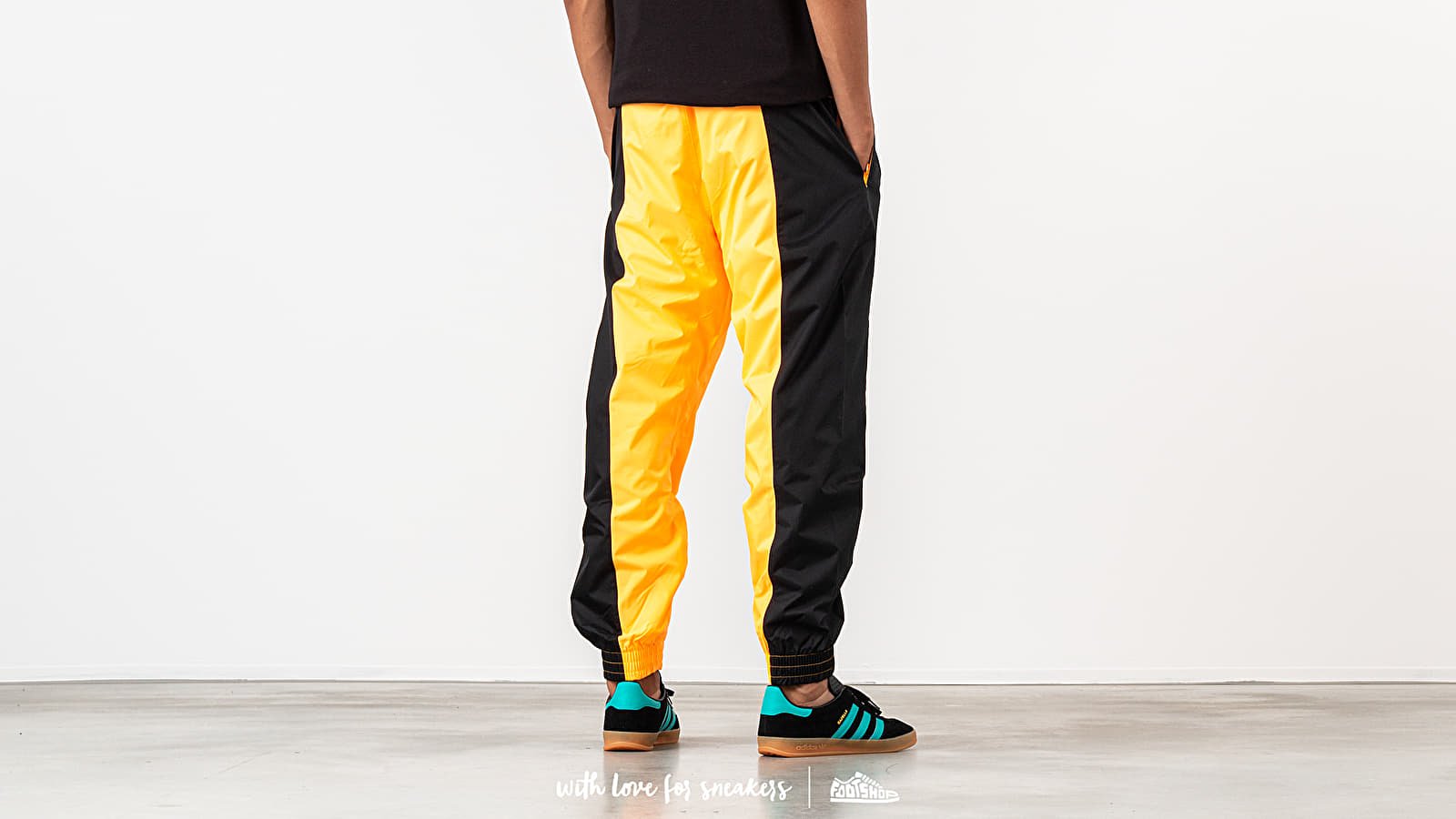 Adidas originals womens ryv track pant flash orange 2025