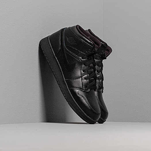 Jordan 1 hotsell mid femme noir