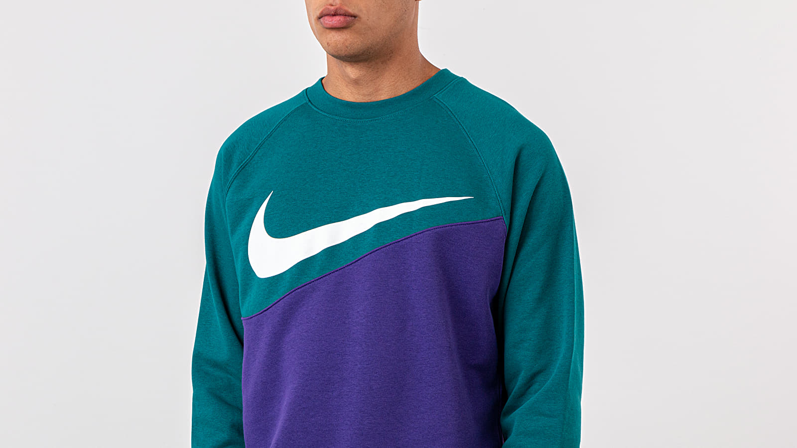 purple and turquoise nike shirt