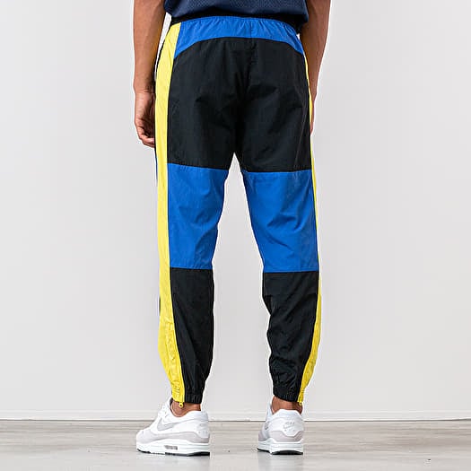 Blue and yellow nike pants online