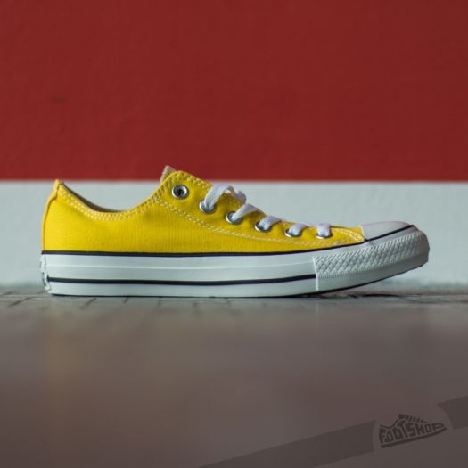 Faded yellow converse shop