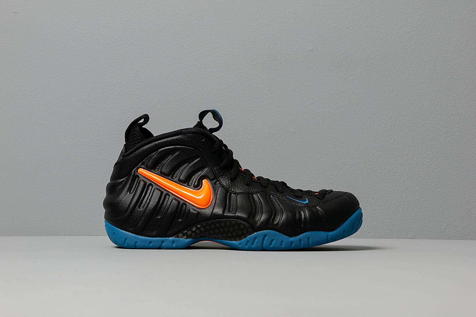 Black orange and shop blue foamposites
