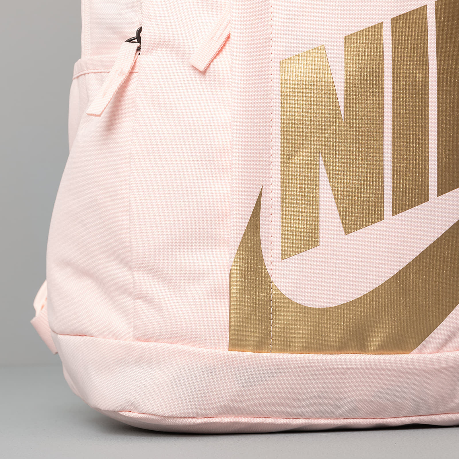 Pink and 2024 gold nike backpack