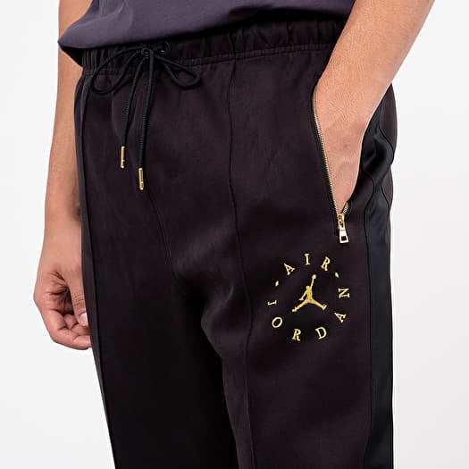 Black and top gold jordan pants