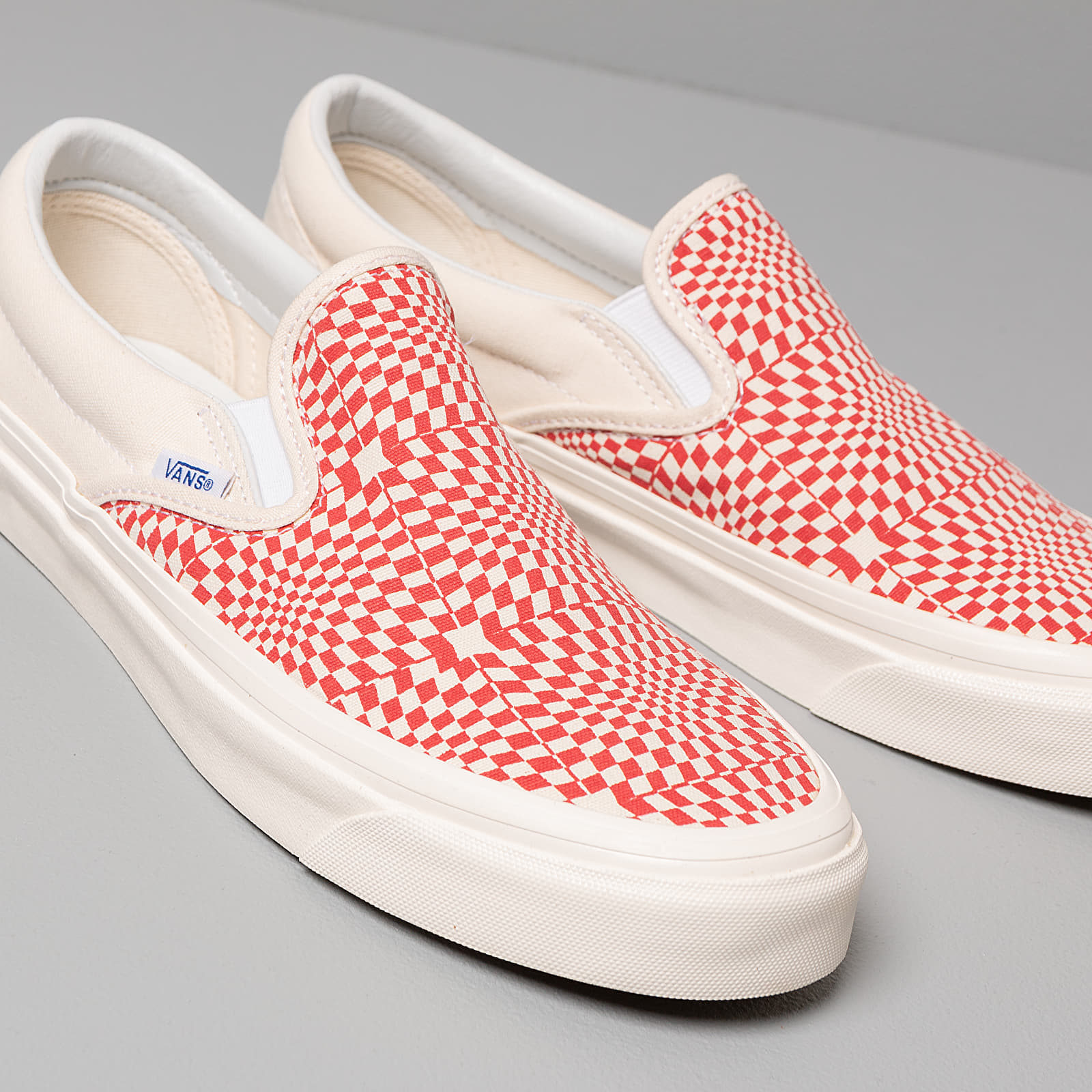 Red slip on sale vans womens