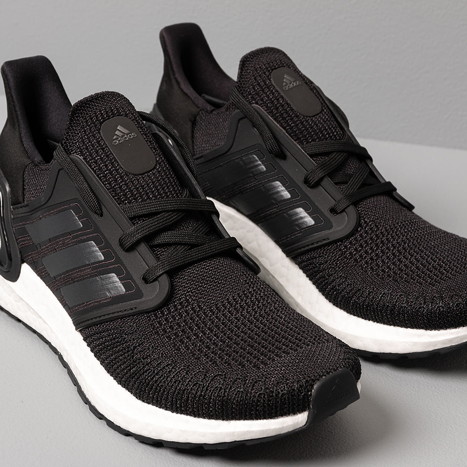 Adidas ultra boost 2.0 nere strisce bianche deals