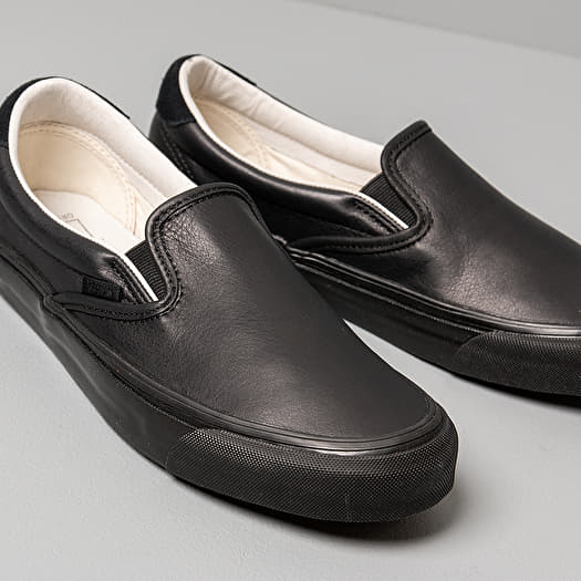 Suede black slip on vans on sale