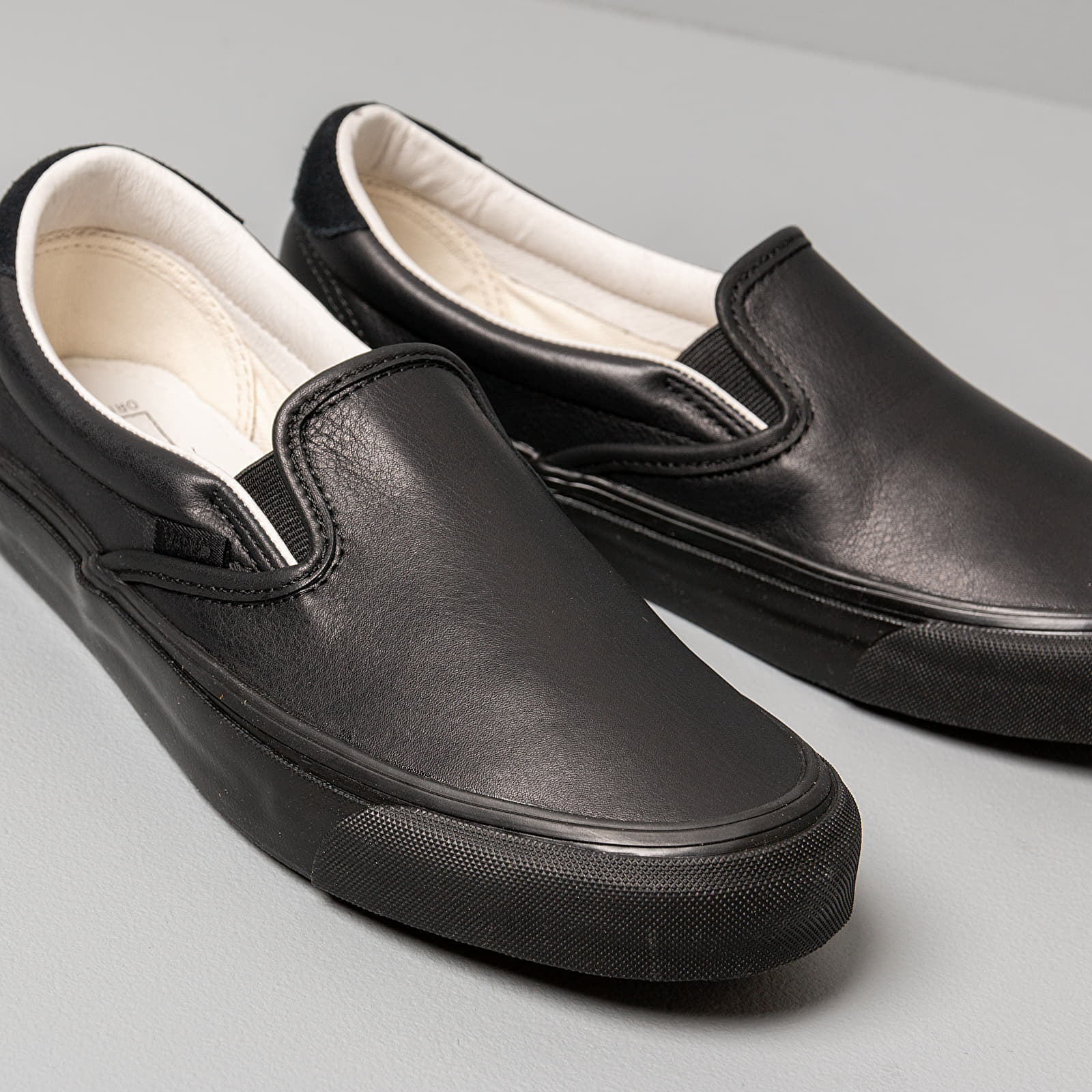 Vans slip ons shop leather and suede