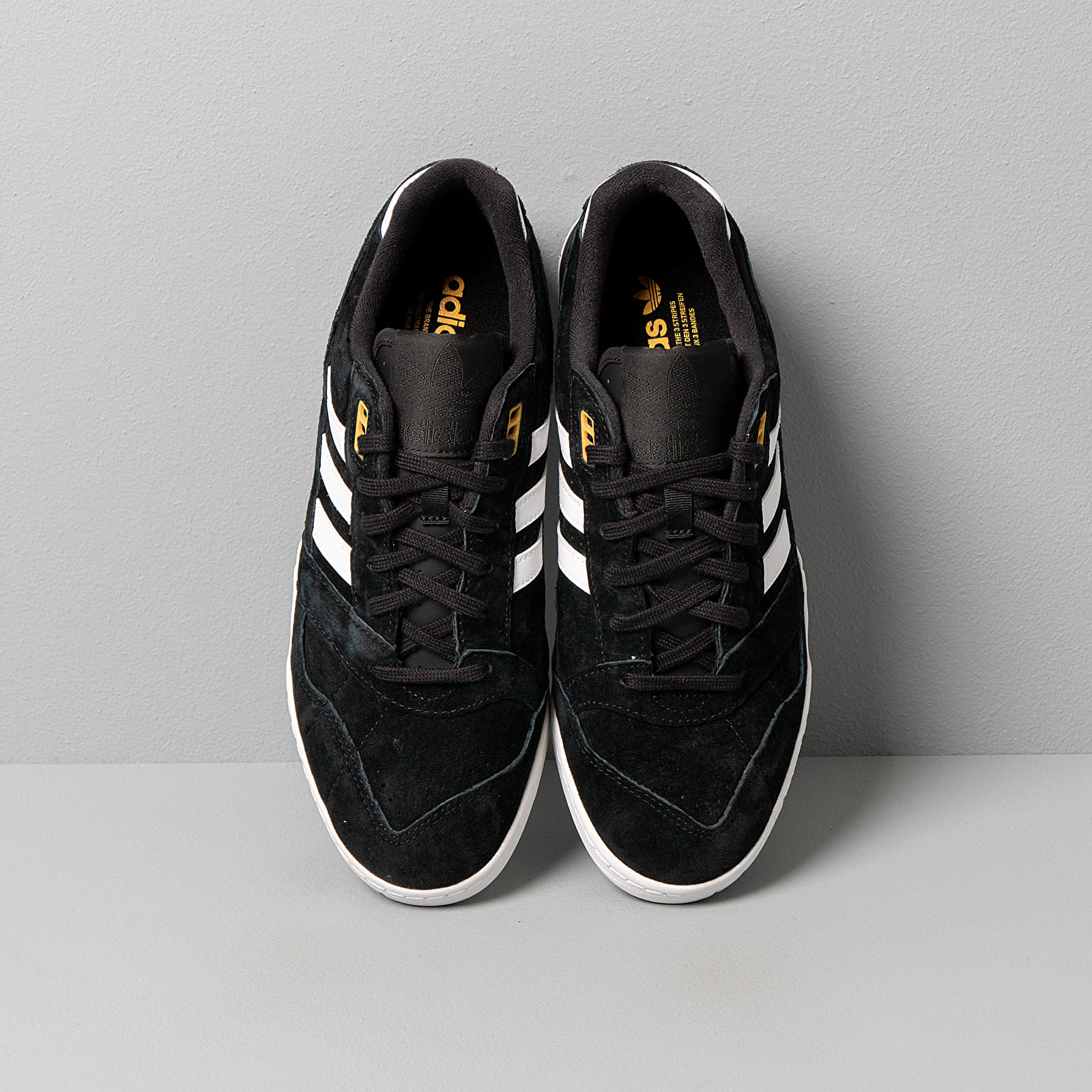 Adidas black and gold trainers sale