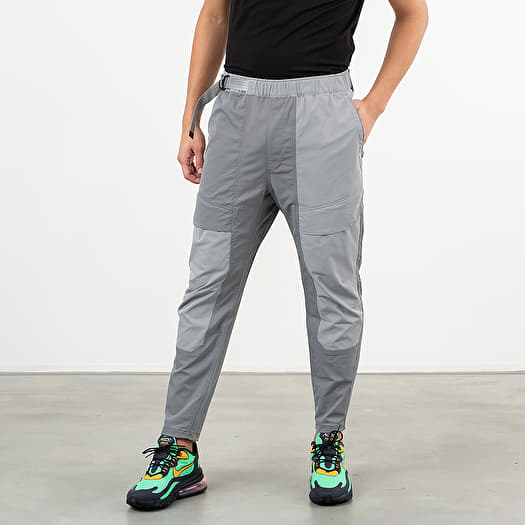 Pants and jeans Nike Sportswear Tech Pack Woven Pants Smoke Grey Particle Grey Black Footshop
