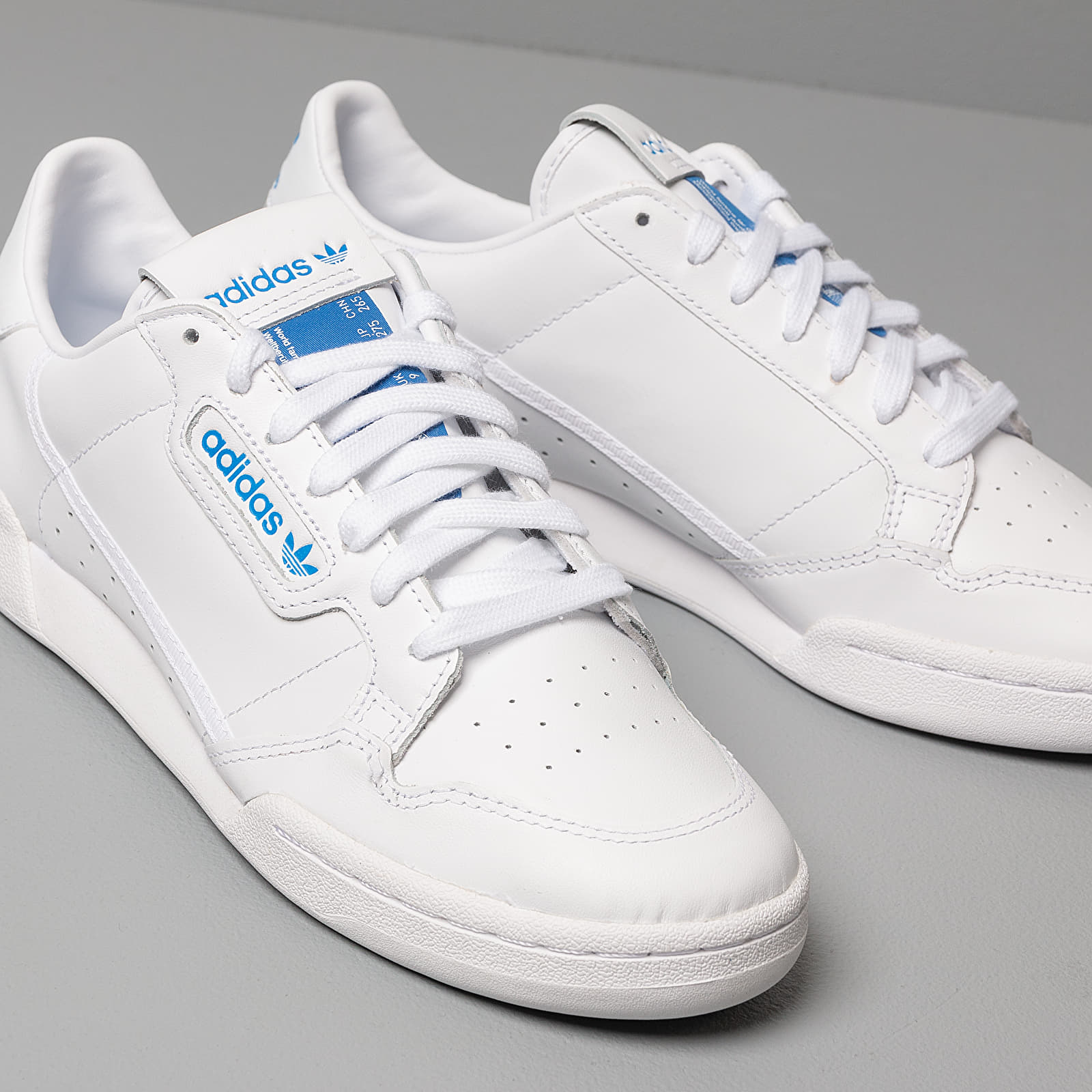 Adidas continental white store
