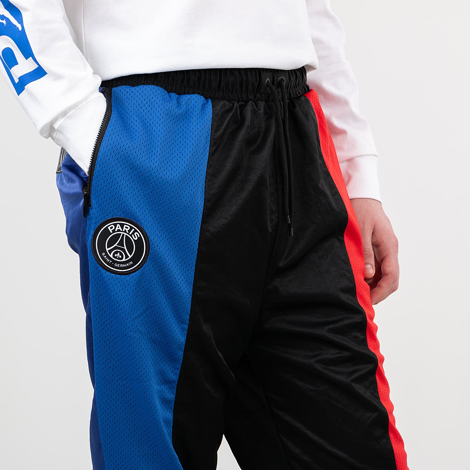 Nadrágok Jordan Paris Saint-Germain Air Jordan Suit Pants Black/ Game Royal/ University Red