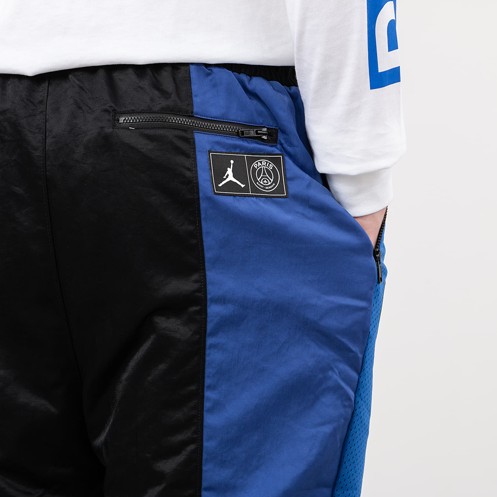 Nadrágok Jordan Paris Saint-Germain Air Jordan Suit Pants Black/ Game Royal/ University Red